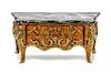 A Louis XV Style Marquetry and Gilt Metal Mounted Commode Height 2 5/8 x width 5 5/8 x depth 2 1/4 inches.