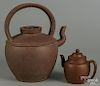 Two Chinese Yixing teapots, 6'' h. and 14 1/2'' h.