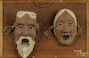 Pair of Korean pottery masks, 11'' x 16 1/2'' (mounting).