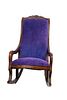 CARVED MAHOGANY ROCKING CHAIR, 20TH C., H 33", W 20", D 20" 