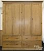 Large Irish pine press cupboard, 19th c., 107'' h., 86'' w.
