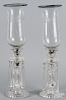 Pair of colorless glass table lights, with etched hurricane shades, 21'' h.