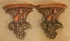 PAIR OF COMPOSITION FIGURAL WALL SHELVES, H 8", W 10.5" 