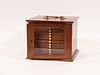MAHOGANY & BRASS COIN CABINET, H 7", W 8.5" 