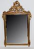 Gilt Louis XVI style mirror