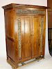 Chinese 2 door armoire in teak with floral carving