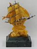 Carved Amber Ship on Marble Base.