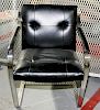 A Bruton Leather and Chrome Open Armchair Height 32 inches.
