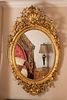 FRENCH LOUIS XVI STYLE OVAL GILT GESSO OVER WOOD MIRROR, MID 20TH C., H 51", W 31" 