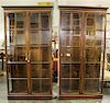 * A Pair of Parcel Gilt Vitrine Cabinets Height 85 x width 44 x depth 13 3/4 inches.