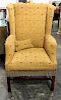 * A George III Style Mahogany Wingback Chair. Height of chair 45 1/2 inches.