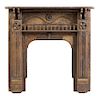 An American Parcel Gilt and Ebonized Fireplace Surround Height 48 1/2 x width 41 1/2 x depth 9 inches.
