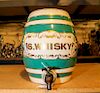 * A Ceramic Whiskey Dispenser Height 11 inches.