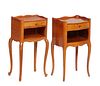 Pair of French Louis XV Style Carved Cherry Nightstands, 20th c., the bowed three-quarter galleried tops over a frieze drawer and open storage, on tap