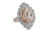 14K Rose Gold Morganite Dinner Ring, with an oval 4.83 ct. morganite atop a stepped floriform border of round diamonds, the shoulders of the band also