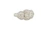 Lady's Platinum Diamond Dinner Ring, with a central round 1.01 ct. diamond, within diamond baguette mounted lugs, within a shaped diamond mounted bord