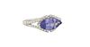 Lady's 18K White Gold Dinner Ring, with a horizontal 2.15 ct. marquise tanzanite, centering diamond mounted split sides and shoulders of the band, tot