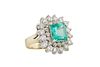 14K Yellow Gold Dinner Ring, with a 2.90 Ct. Emerald, atop a double graduated border of round diamonds, total diamond wt.- app. 1.8 cts, Size 8 1/4.