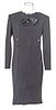 CHANEL (CO.) (FRENCH, ESTABLISHED 1909) LONG SLEEVE BLACK DRESS WITH MONOGRAMED GOLD BUTTONS AND SATIN BOW 