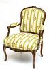 LOUIS XV STYLE CARVED WALNUT OPEN ARMCHAIR, CIRCA 1950 H 36" W 26" D 27" 