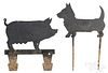 Cast iron pig and dog bootscrapes