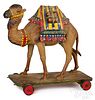Composition camel skittles pull toy