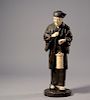 Fine Meiji period Japanese bronze and ivory figure of elderly gentleman carrying an ivory lantern