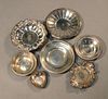Seven sterling bowls and plates 31 ozs