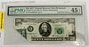 $20.DOLLAR S/N ERROR ON FOLDED NOTE 1977, SERIAL NUMBER E-32460589-C, 'PMG - CERTIFIED' # FR-2072, GRADE: MS-67 (1) H 6" , W 8.5"