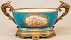 FRENCH PORCELAIN AND BRONZE JARDINERE CIRCA 1900 H 13", L 24"
