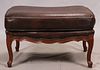 BAKER FURNITURE CO. WALNUT AND LEATHER OTTOMAN H 17" W 29" L 21" 