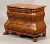MAITLAND SMITH, LEATHER & CARVED WALNUT BOMBE CHEST, H 33" L 42", D 23" 