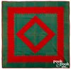 Red and green sawtooth diamond in square quilt