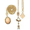 THREE GOLD WATCH CHAIN NECKLACES WITH PENDANTS