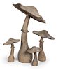 A Set of Four French Wood Models of Mushrooms Height of tallest 40 inches.