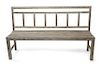 A Weathered Wooden Garden Bench Height 37 x width 63 inches.