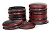 A Pair of Red and Black Lacquer Stacked Monks Bowls Height 9 1/2 inches.