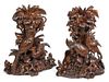 A Pair of Continental Carved Wood Sculptures Height 15 x width 12 inches.