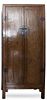 A Southeast Asian Metal Mounted Tall Rosewood Cabinet Height 91 x width 40 x depth 26 inches.