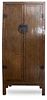 A Southeast Asian Metal Mounted Tall Rosewood Cabinet Height 91 x width 40 x depth 26 inches.
