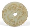 A Chinese Carved Jade Bi Disc Diameter 2 1/4 inches.