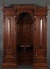 A LARGE AND IMPRESSIVE CARVED OAK CABINET WITH
