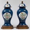 Pair of Chinese Powder Blue Ground Porcelain Gilt-Metal-Mounted Vases and Covers
