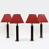Set of Four Patinated Metal Table Lamps with Red Tole Shades