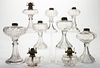 ASSORTED GLASS KEROSENE STAND LAMPS, LOT OF NINE,