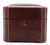 * A Leather Clad Humidor Music Box, Height 6 1/4 x width 8 x depth 6 1/8 inches.