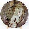 * A Plum Tree Pottery Charger, John Glick, Diameter 18 1/2 inches.