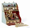 French Loterie Parisienne parlor toy with a gaming wheel and a large group of prizes