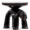 An African Carved Wood Stool, Height 9 1/2 inches.