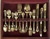 An American Gilt-Plated Flatware Service, Godinger, 20th Century, comprising 12 dinner knives 12 dinner forks 12 teaspoons 12 de